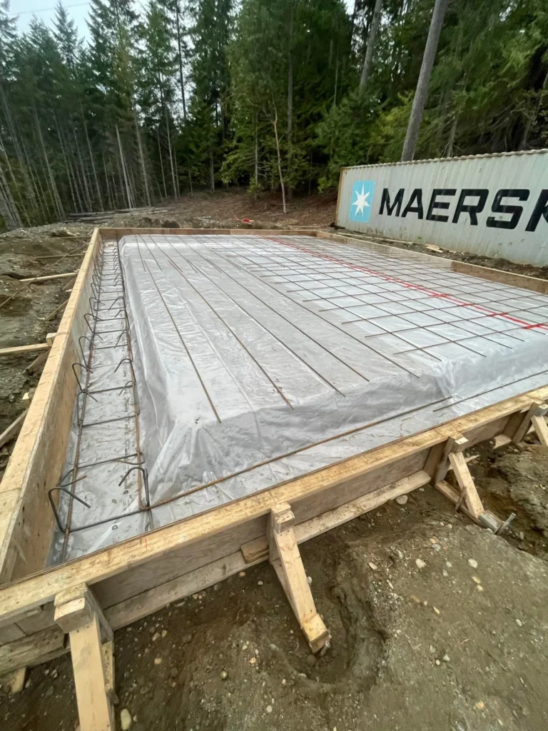 Standard 4–6 inch concrete slab with mesh or rebar reinforcement