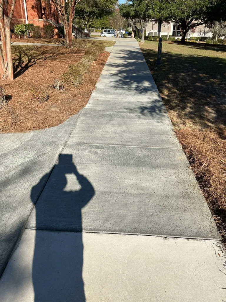 Concrete sidewalk in Edmonton designed to withstand freeze–thaw cycles and heavy snow.