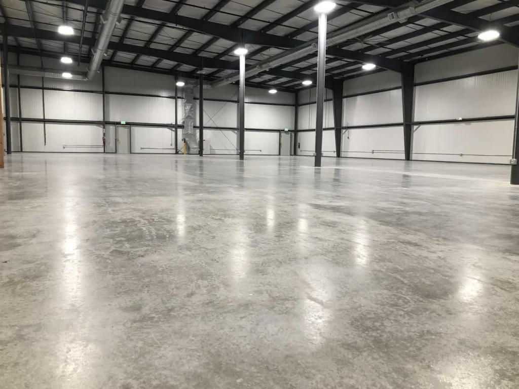 Industrial concrete warehouse floor in Edmonton designed for heavy-duty use, forklift traffic, and long-term durability